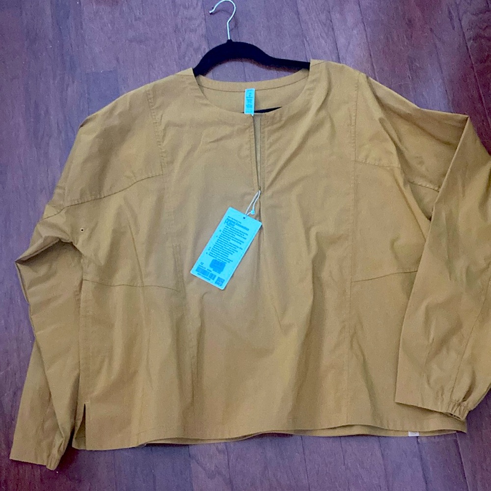 lululemon athletica Long Sleeve windbreaker in Mustard Yellow Against Convention